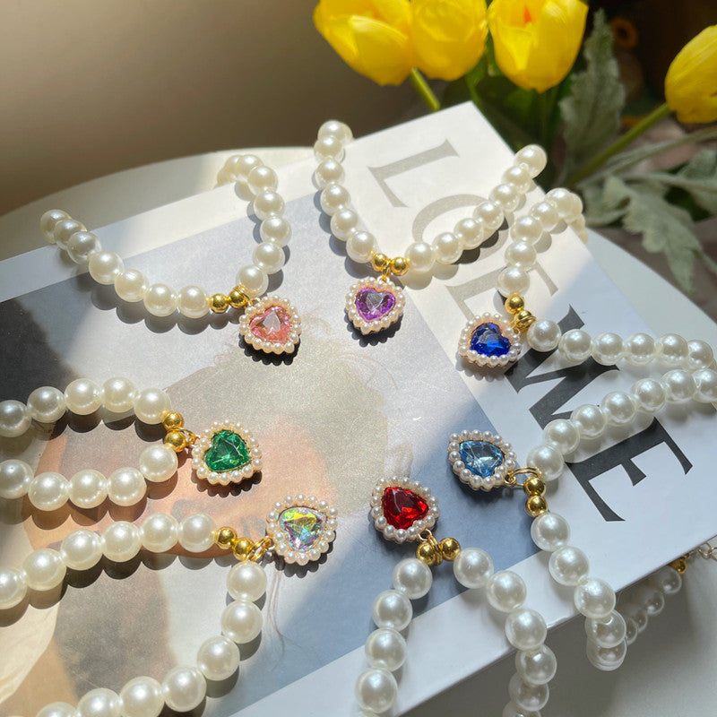 Collar retro de perlas y corazón para mascotas